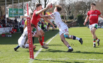 260323 - Wales U18 v England U18 - Harry Rees-Weldon of Wales is forced into touch just short of the try line