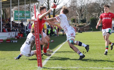 260323 - Wales U18 v England U18 - Harry Rees-Weldon of Wales is forced into touch just short of the try line