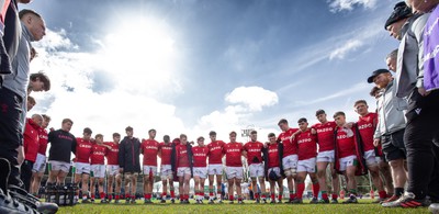 260323 - Wales U18 v England U18 - The Wales team huddle together at the end of there match