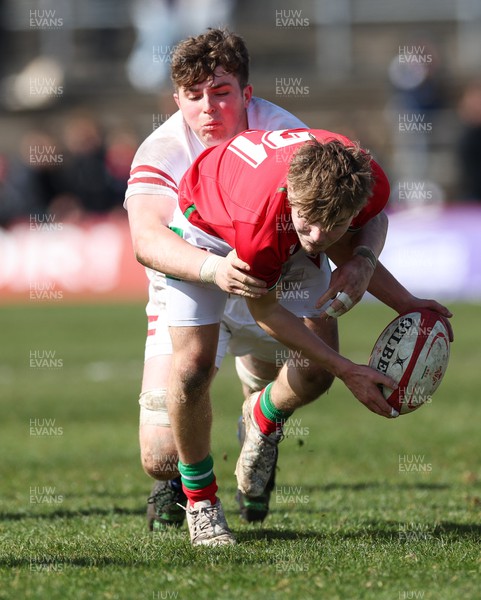 260323 - Wales U18 v England U18 - Carwyn Edwards of Wales is tackled