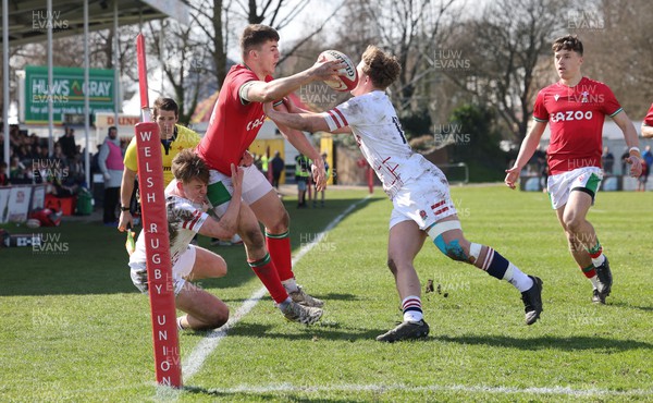 260323 - Wales U18 v England U18 - Harry Rees-Weldon of Wales is forced into touch just short of the try line