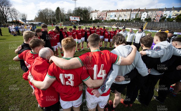 260323 - Wales U18 v England U18 - The Wales team huddle together at the end of there match