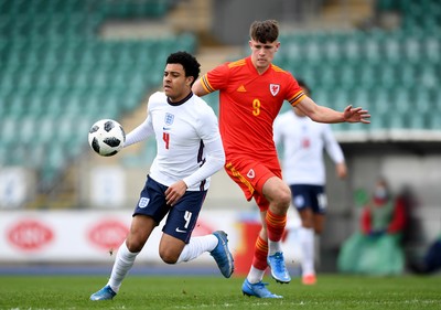 290321 - Wales U18 v England U18 - Under 18 International Match - CJ Egan-Riley of England and Ryan Viggars of Wales