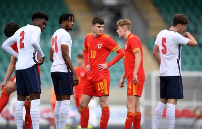 290321 - Wales U18 v England U18 - Under 18 International Match - Daniel Oyegoke, James Balagizi and William Fish of England with Joel Cotterill and Harry Jones of Wales