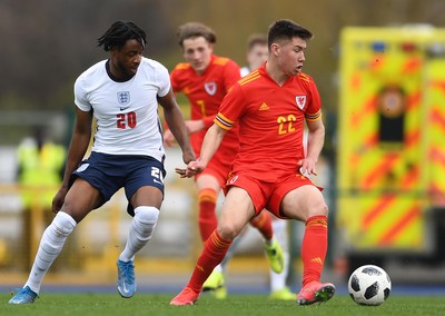 290321 - Wales U18 v England U18 - Under 18 International Match - James Balagizi of England and Cameron Congreve of Wales