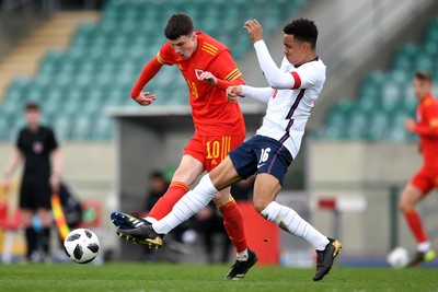 290321 - Wales U18 v England U18 - Under 18 International Match - Joel Cotterill of Wales and Aaron Ramsey of England