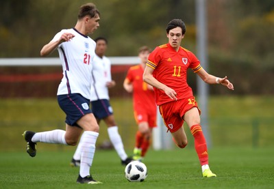 290321 - Wales U18 v England U18 - Under 18 International Match - Callum Doyle of England and Chris Popov of Wales