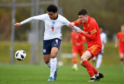 290321 - Wales U18 v England U18 - Under 18 International Match - CJ Egan-Riley of England and Joel Cotterill of Wales