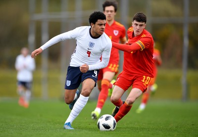 290321 - Wales U18 v England U18 - Under 18 International Match - CJ Egan-Riley of England and Joel Cotterill of Wales