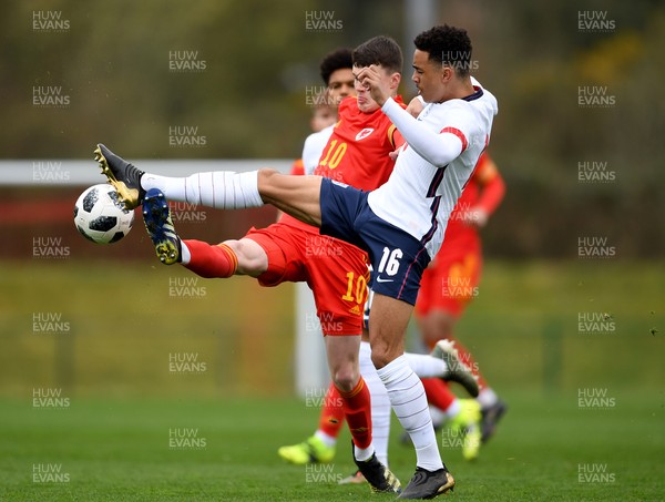 290321 - Wales U18 v England U18 - Under 18 International Match - Joel Cotterill of Wales competes with Aaron Ramsey of England