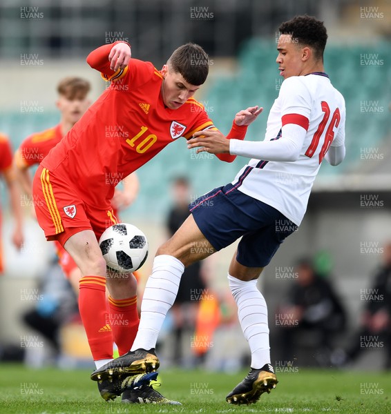 290321 - Wales U18 v England U18 - Under 18 International Match - Joel Cotterill of Wales and Aaron Ramsey of England