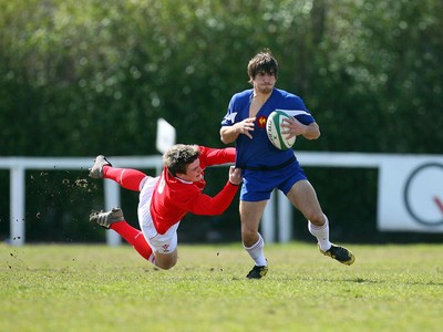 01.04.08 - Wales v France - Under 18 Six Nations 2008 - France's Julien Cabannes gets tackled by Scott Williams of Wales  