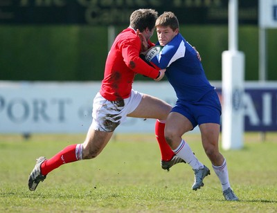 01.04.08 - Wales v France - Under 18 Six Nations 2008 - France's Camille Canivet gets tackled by Scott Williams of Wales  