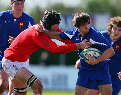 01.04.08 - Wales v France - Under 18 Six Nations 2008 - France's Julien Cabannes gets tackled by Lloyd Peers of Wales  