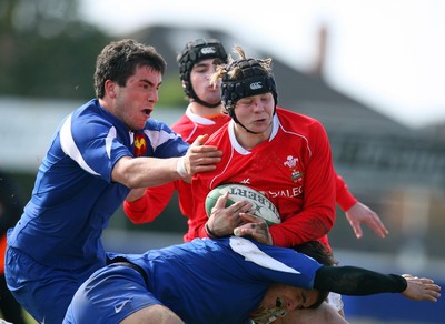 01.04.08 - Wales v France - Under 18 Six Nations 2008 - France's Adrien Alazard and Sonny Falconetti tackle James Davies of Wales  
