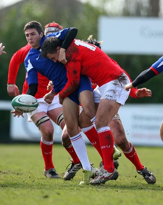01.04.08 - Wales v France - Under 18 Six Nations 2008 - France's Clement Baldy gtes tackled by Ashley Beck of Wales  