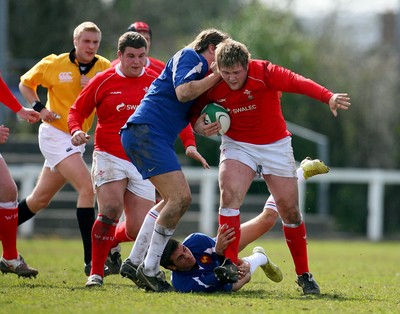 01.04.08 - Wales v France - Under 18 Six Nations 2008 - Rhys Williams of Wales gets tackled by the France defence 