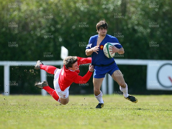 01.04.08 - Wales v France - Under 18 Six Nations 2008 - France's Julien Cabannes gets tackled by Scott Williams of Wales  