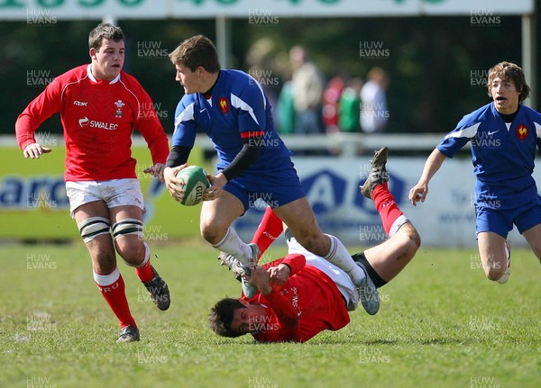 01.04.08 - Wales v France - Under 18 Six Nations 2008 - France's Camille Canivet gets tackled Rhys Downes of Wales  