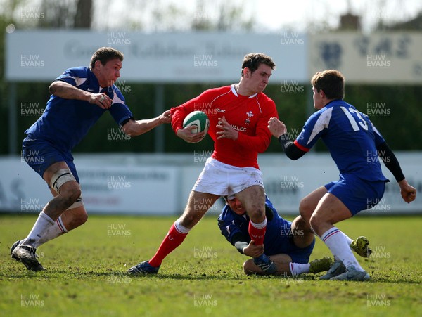 01.04.08 - Wales v France - Under 18 Six Nations 2008 - France's Sebastien Mazet, Camille Canivet and Clement Baldy tackle James Loxton of Wales  