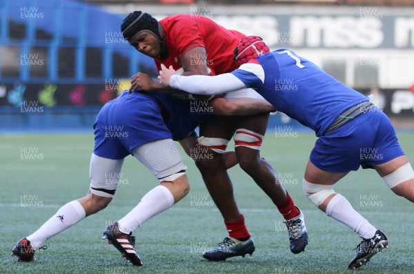 170319 - Wales U18 v France U18, Under 18 International - Christ Tshiunza of Wales is held by the French defence