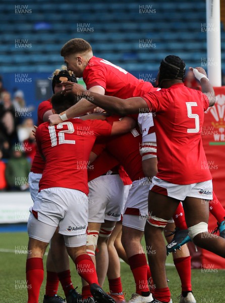 170319 - Wales U18 v France U18, Under 18 International - Team mates celebrate with Harri Deaves of Wales after he scores try