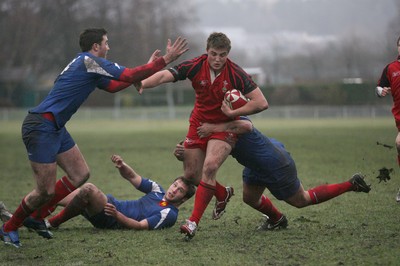 24.02.08 .. Wales U18 XV v France U18 Academy, Ebbw Vale -  Wales' Liam Powell charges towards the French line 