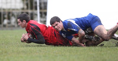 24.02.08 .. Wales U18 XV v France U18 Academy, Ebbw Vale -  Wales' Kristian Phillips beats Lucas Dupont to score try 