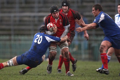 24.02.08 .. Wales U18 XV v France U18 Academy, Ebbw Vale -  Wales' Dave Francis takes on Adrien Gach 