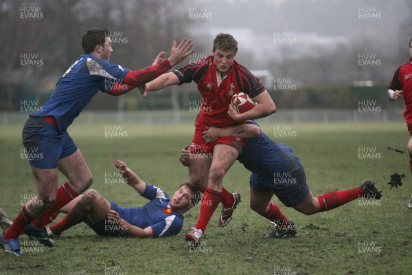 24.02.08 .. Wales U18 XV v France U18 Academy, Ebbw Vale -  Wales' Liam Powell charges towards the French line 