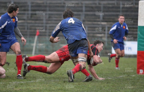 24.02.08 .. Wales U18 XV v France U18 Academy, Ebbw Vale -  Wales' Ashley Beck dives into score try 