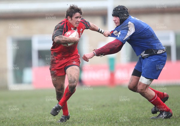 24.02.08 .. Wales U18 XV v France U18 Academy, Ebbw Vale -  Wales' Rhys Downes breaks through the French defence 