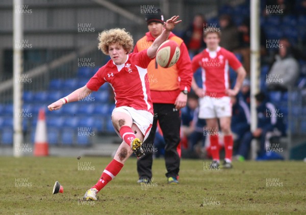 240213 Wales U18 v France U18 - U18 Championship -Wales' Angus O'Brien kicks a goal 