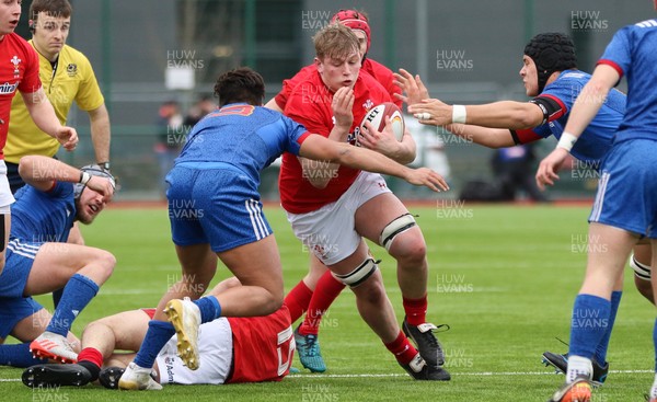 310318 - Wales U18 v France U18, U18s Six Nations Festival, Ystrad Mynach - Jac Morgan of Wales charges at the French defence