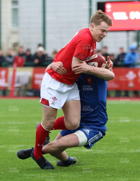 310318 - Wales U18 v France U18, U18s Six Nations Festival, Ystrad Mynach - Sam Costelow of Wales is tackled short of the try line