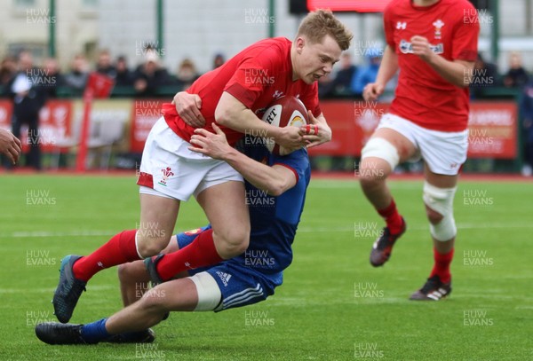 310318 - Wales U18 v France U18, U18s Six Nations Festival, Ystrad Mynach - Sam Costelow of Wales is tackled short of the try line
