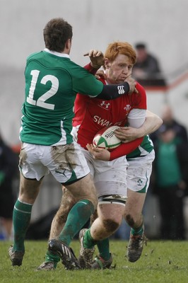 02.04.10 Ireland U18 v Wales U18 - Under 18s 5 Nations Festival -  Wales' Dan Baker is tackled by Ireland's JJ Hanrahan(12) and Patrick Jackson. 