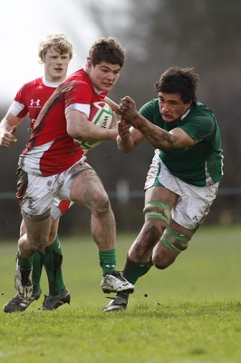 02.04.10 Ireland U18 v Wales U18 - Under 18s 5 Nations Festival -  Wales' Harry Robinson hands off Ireland'sYAsin Browne. 