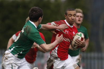 02.04.10 Ireland U18 v Wales U18 - Under 18s 5 Nations Festival -  Wales' Eli Walker tries to hand off Ireland's Charlie Simpson. 