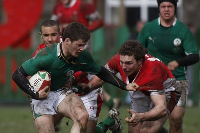 02.04.10 Ireland U18 v Wales U18 - Under 18s 5 Nations Festival -  Ireland's Sam Coghlan-Murray tries to fend off Wales' George North as Eli Walker closes in. 