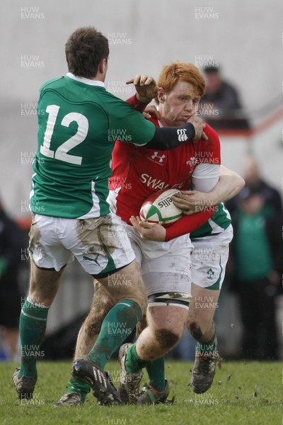 02.04.10 Ireland U18 v Wales U18 - Under 18s 5 Nations Festival -  Wales' Dan Baker is tackled by Ireland's JJ Hanrahan(12) and Patrick Jackson. 