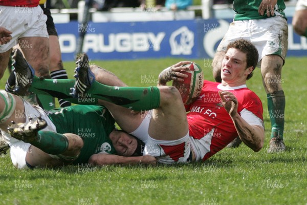 02.04.10 Ireland U18 v Wales U18 - Under 18s 5 Nations Festival -  Wales' George North crashes through Ireland's Aaron Conneely to score the games opening try. 