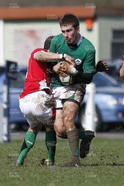 02.04.10 Ireland U18 v Wales U18 - Under 18s 5 Nations Festival -  Ireland's JJ Hanrahan powers through Wales' Matthew Morgan. 