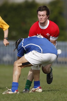 10.04.10 Wales U18 v Italy U18 - Under 18s 5 Nations Festival -  Wales' Harley Thompson is stopped in his tracks by Italy's Guido Calabrese. 