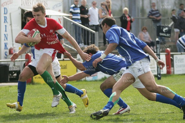 10.04.10 Wales U18 v Italy U18 - Under 18s 5 Nations Festival -  Wales' Tom Prydie tries to escape the tackle of Italy's Talal Rathore. 