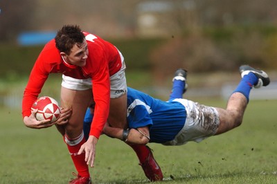 11.03.07 - Under 18 Six Nations Wales u18 v Italy u18 Wales' Ashley Beck is tackled 