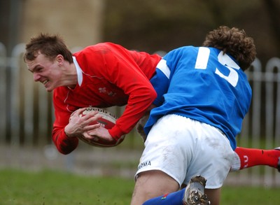11.03.07 - Under 18 Six Nations Wales u18 v Italy u18 Wales' Ryan Bayliss is tackled by Tommaso Benvenuti 