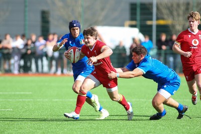 140326 - Wales U18 v Italy U18 - Alfie Luger of Wales is tackled by Pietro Colla of Italy