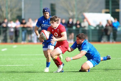 140326 - Wales U18 v Italy U18 - Alfie Luger of Wales is tackled by Pietro Colla of Italy