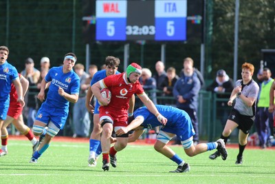 140326 - Wales U18 v Italy U18 - Alfie Prygodzicz of Wales is tackled by Pietro Colla of Italy